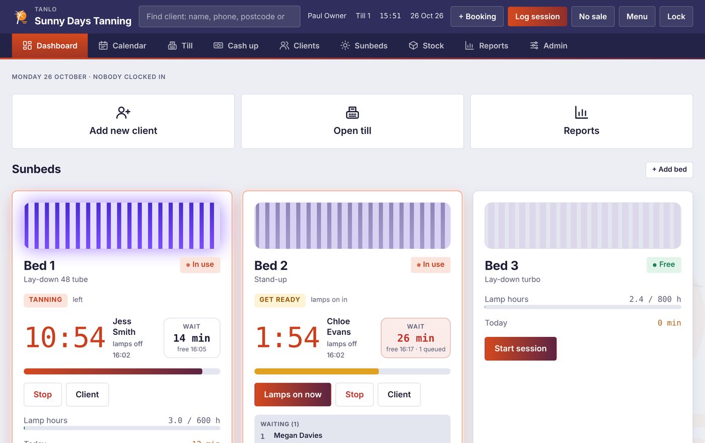 The Tanlo dashboard with three sunbeds: one tanning, one getting ready with a client queued, one free